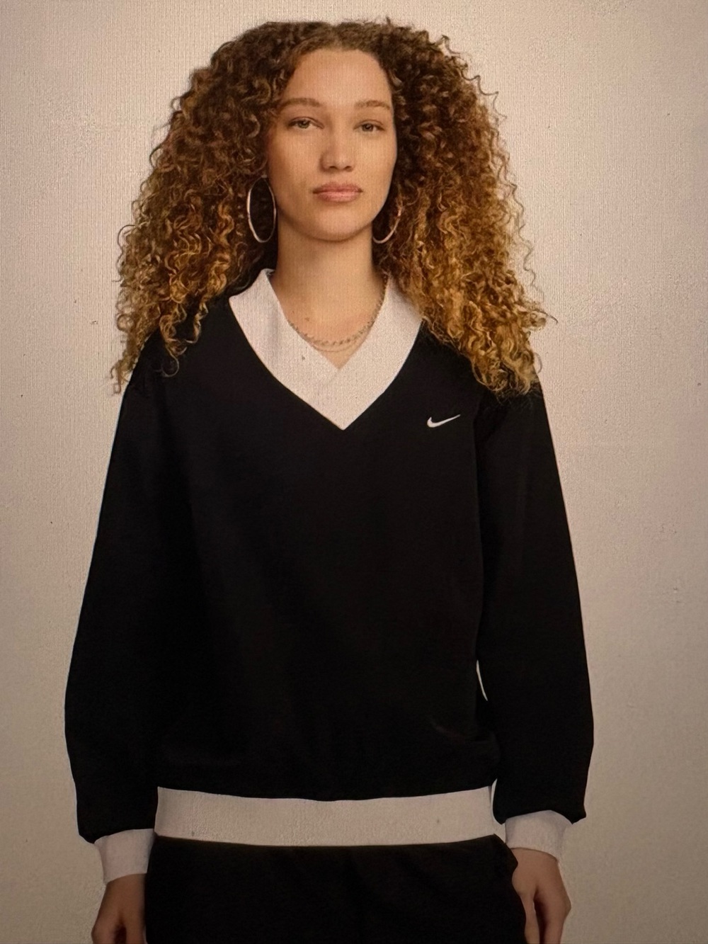 Nike Women’s Sportswear Essential Loose UV Woven Long-Sleeve V-Neck Top
